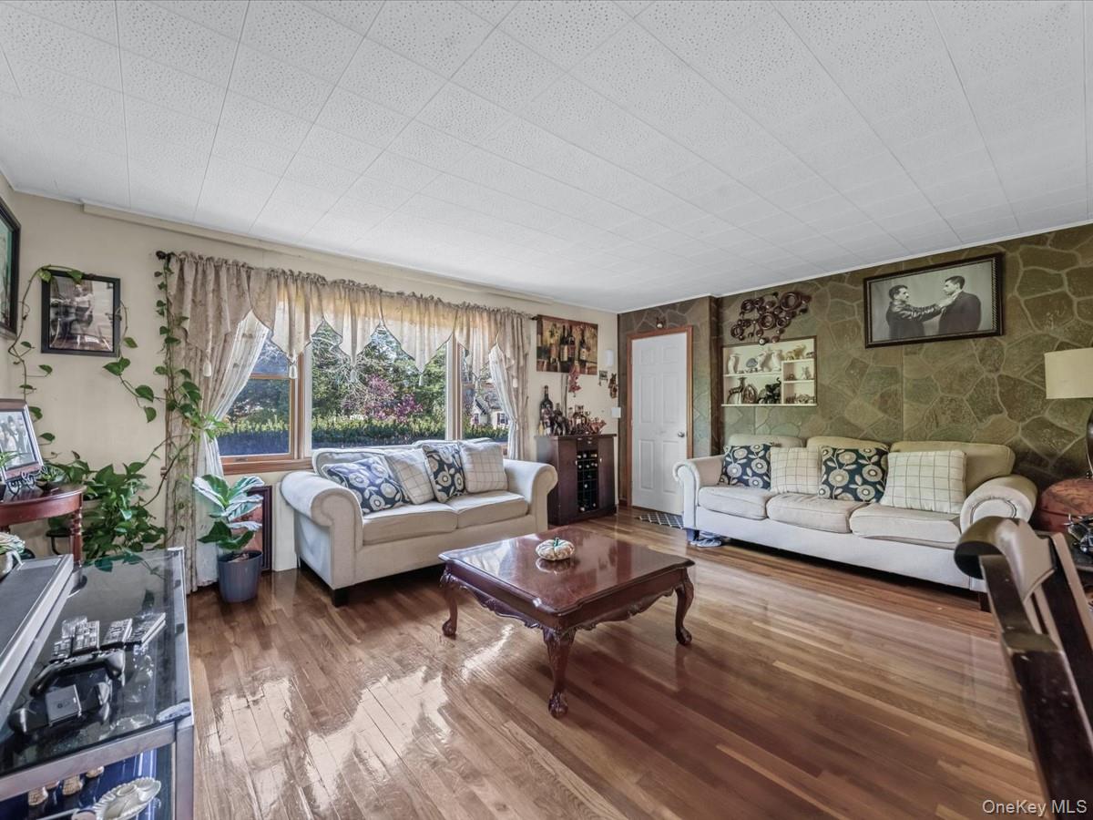 205 Lenox Road Huntington Station, NY 11746 - Photo 4 of 25 Living room with hardwood / wood-style floors