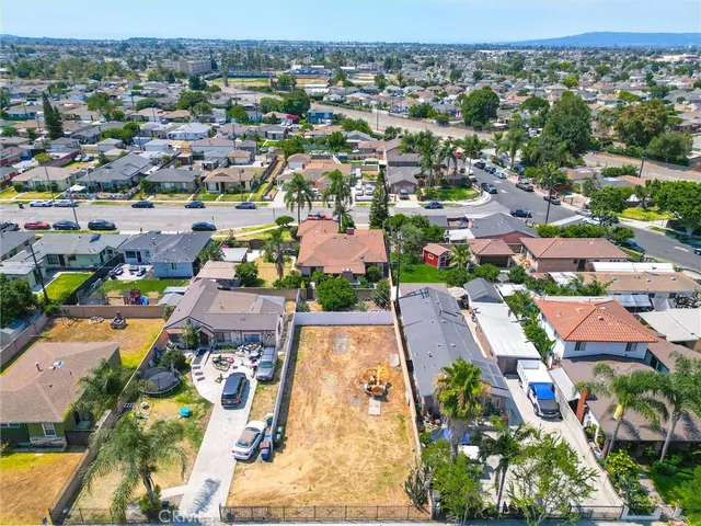 an aerial view of a house with a swimming pool