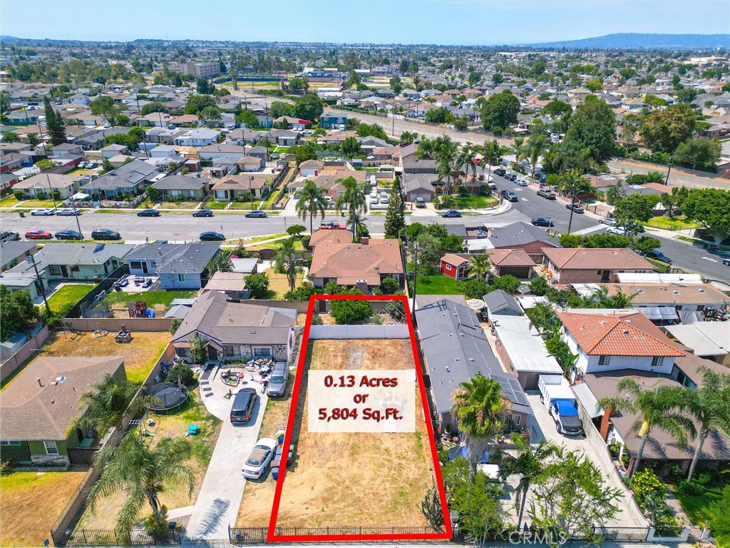 0 West 134th Place Compton, CA 90222 - Photo 4 of 21 an aerial view of residential houses with outdoor space