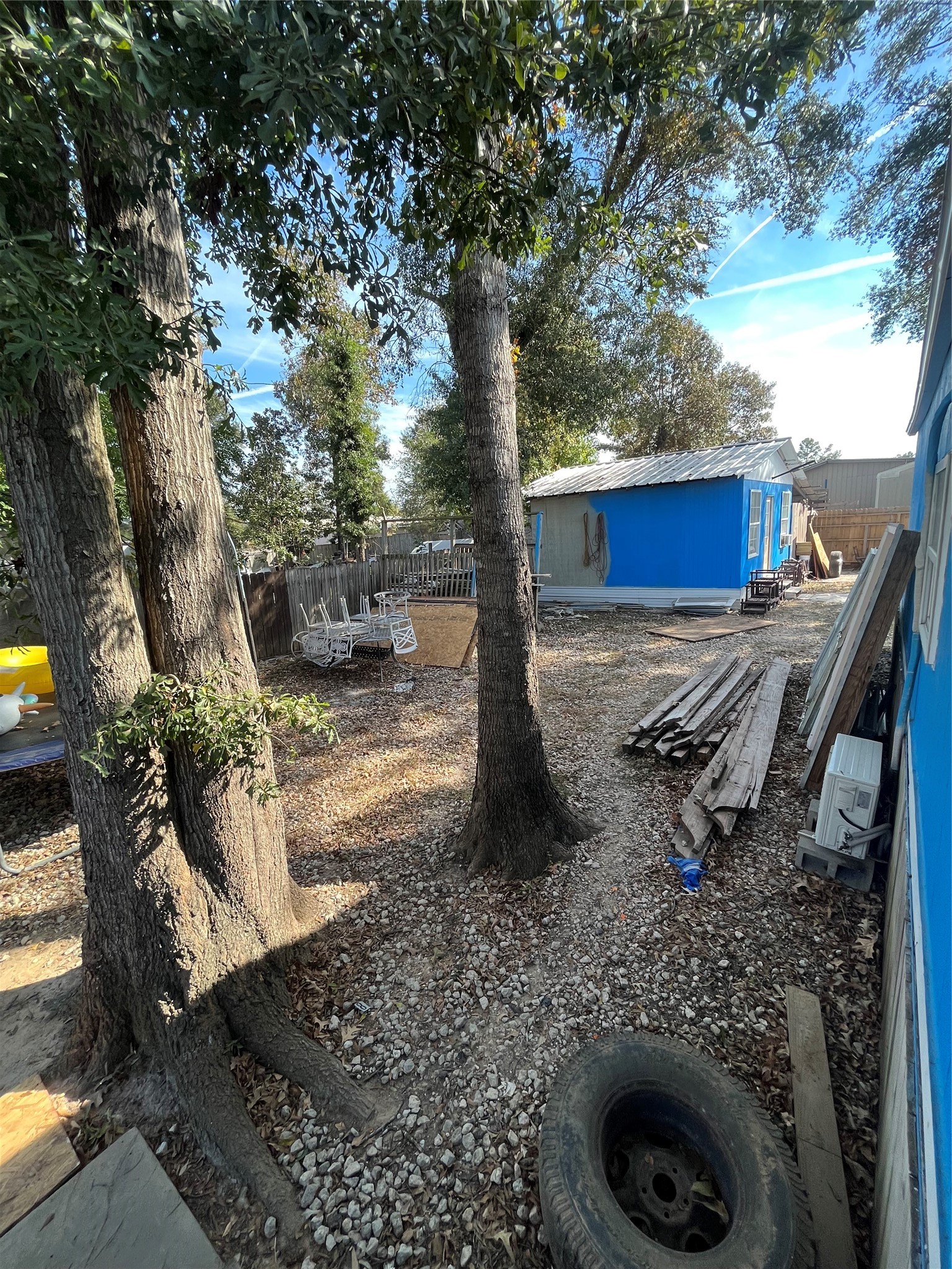 8026 Forest Trace Conroe, TX 77306 - Photo 5 of 28 a view of a yard with plants and trees