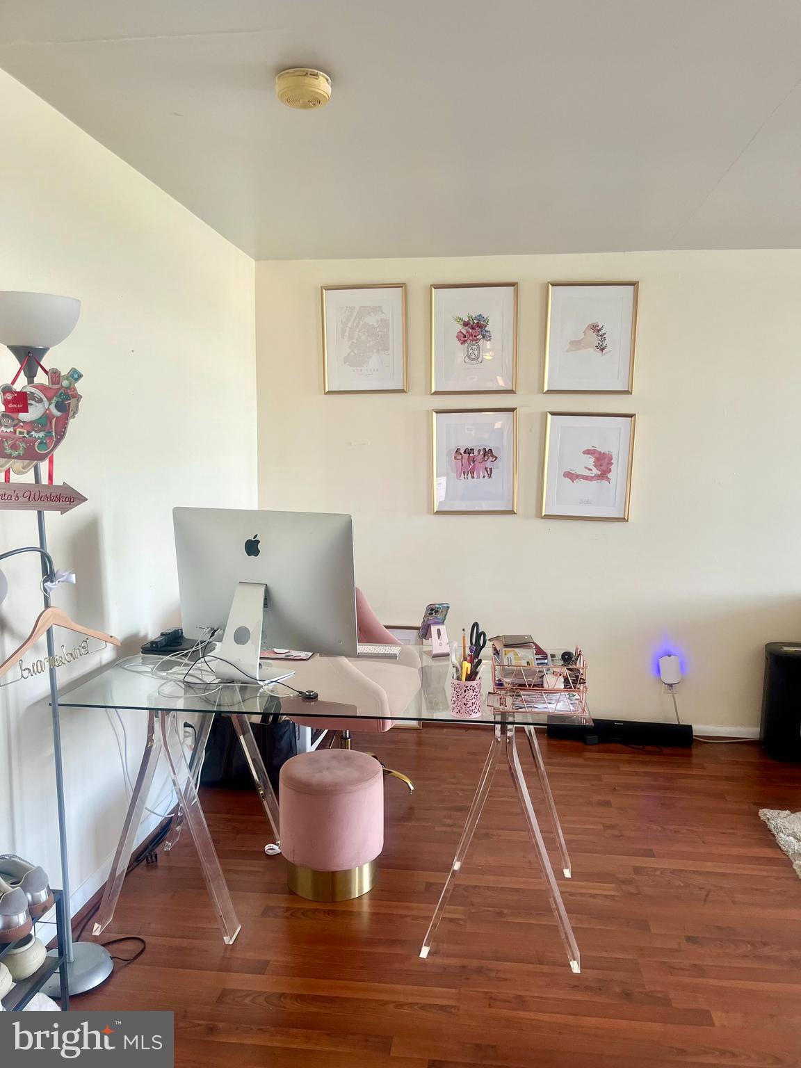 a room with furniture and wooden floor