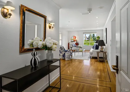 a view of a hallway with washer and dryer