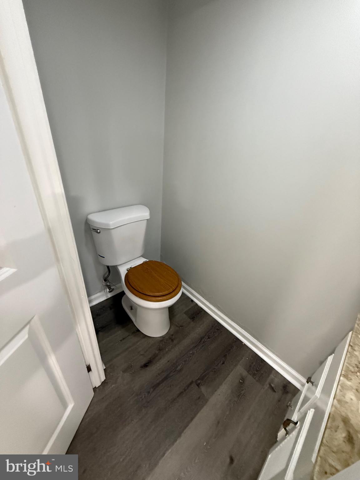 7249 Guilford Road Upper Darby, PA 19082 - Photo 15 of 19 a toilet sitting in a bathroom next to a sink