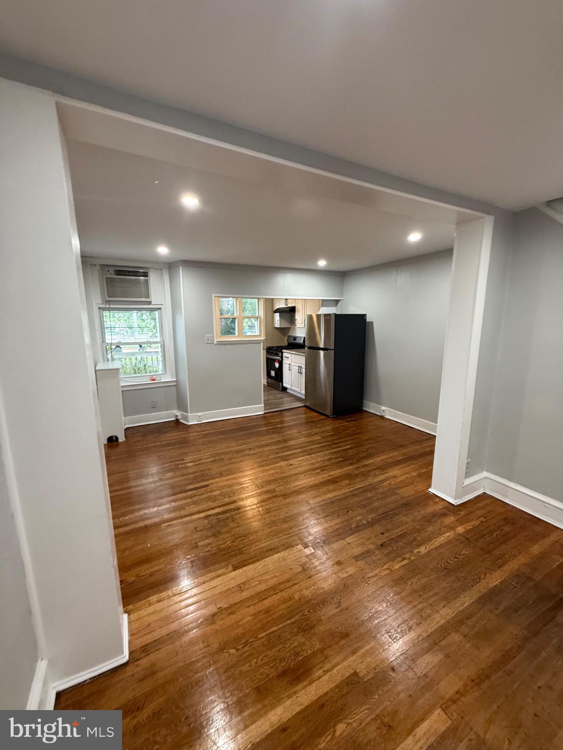 7249 Guilford Road Upper Darby, PA 19082 - Photo 4 of 19 a view of empty room with wooden floor