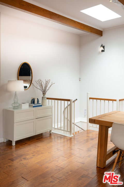 517 West Rustic Road Santa Monica, CA 90402 - Photo 22 of 42 a living room with furniture and a wooden floor