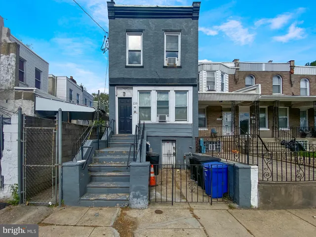 a front view of a house with a porch