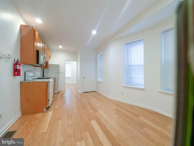 a view of kitchen and utility room