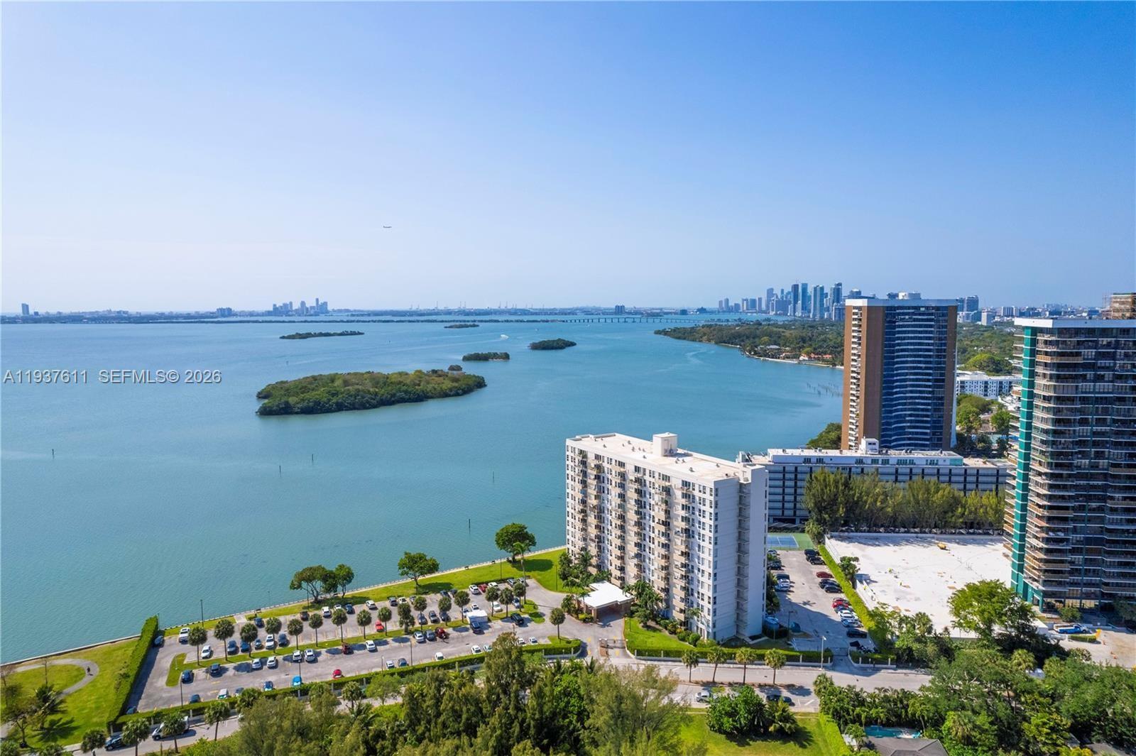880 Northeast 69th Street, Unit 8M Miami, FL 33138 - Photo 9 of 14 a view of ocean and building