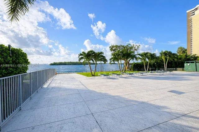a view of swimming pool with a yard