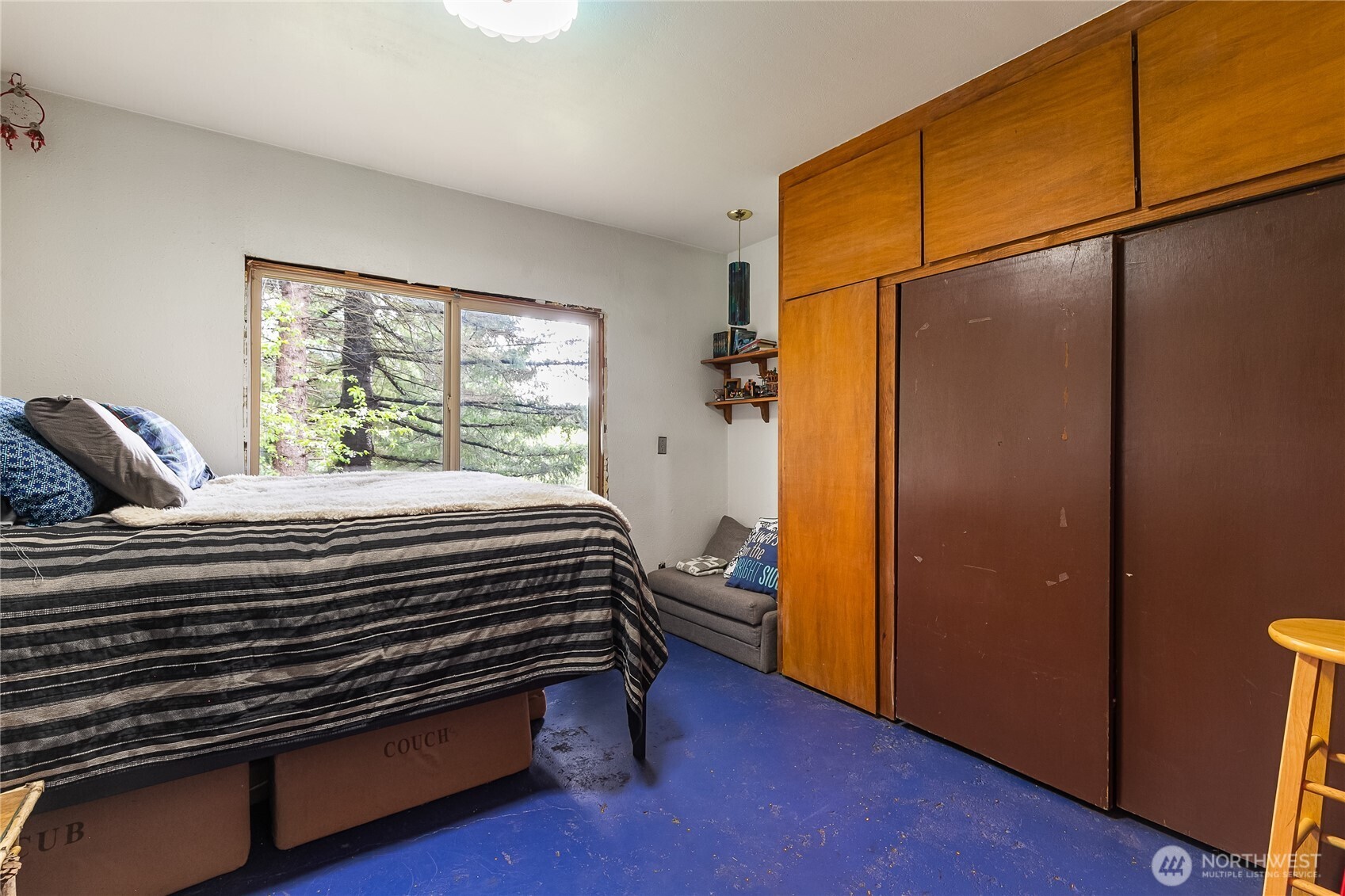 6557 Malloy Road Ferndale, WA 98248 - Photo 11 of 24 a bedroom with a bed and a window