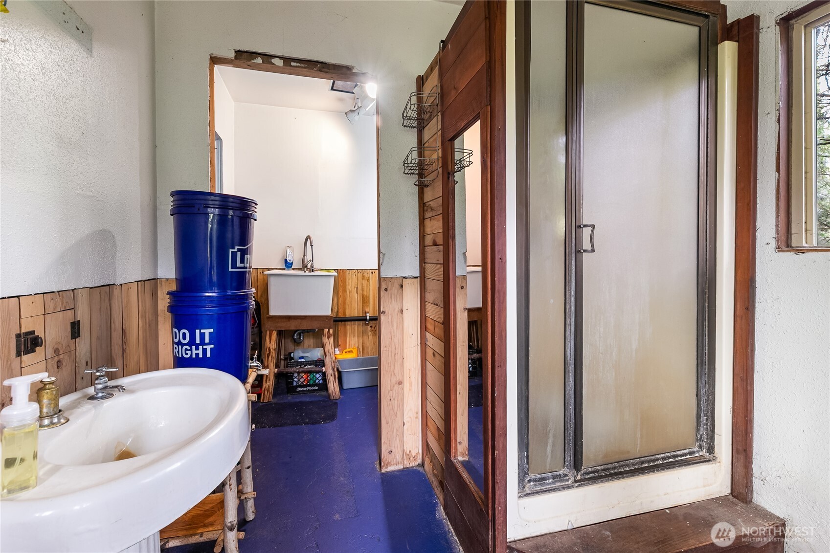 6557 Malloy Road Ferndale, WA 98248 - Photo 13 of 24 a living room with furniture and a fireplace