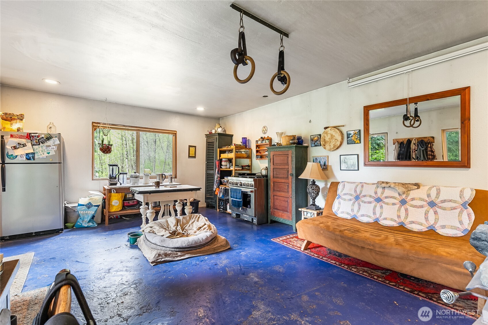 6557 Malloy Road Ferndale, WA 98248 - Photo 5 of 24 a living room with furniture and wooden floor