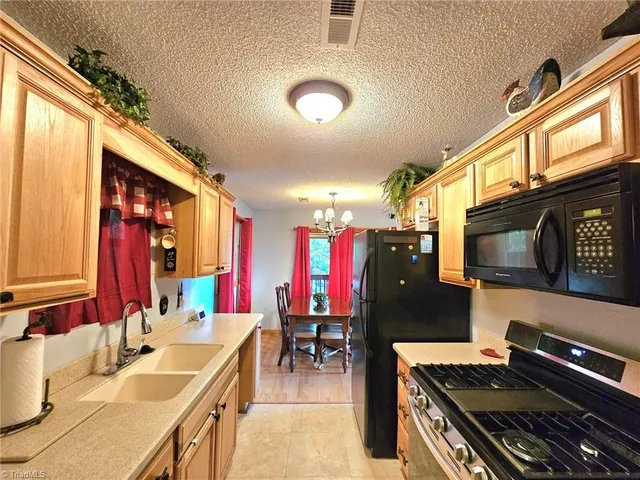 $299,900 | 582 Deer Crossing Lane, Lenoir, NC 28645