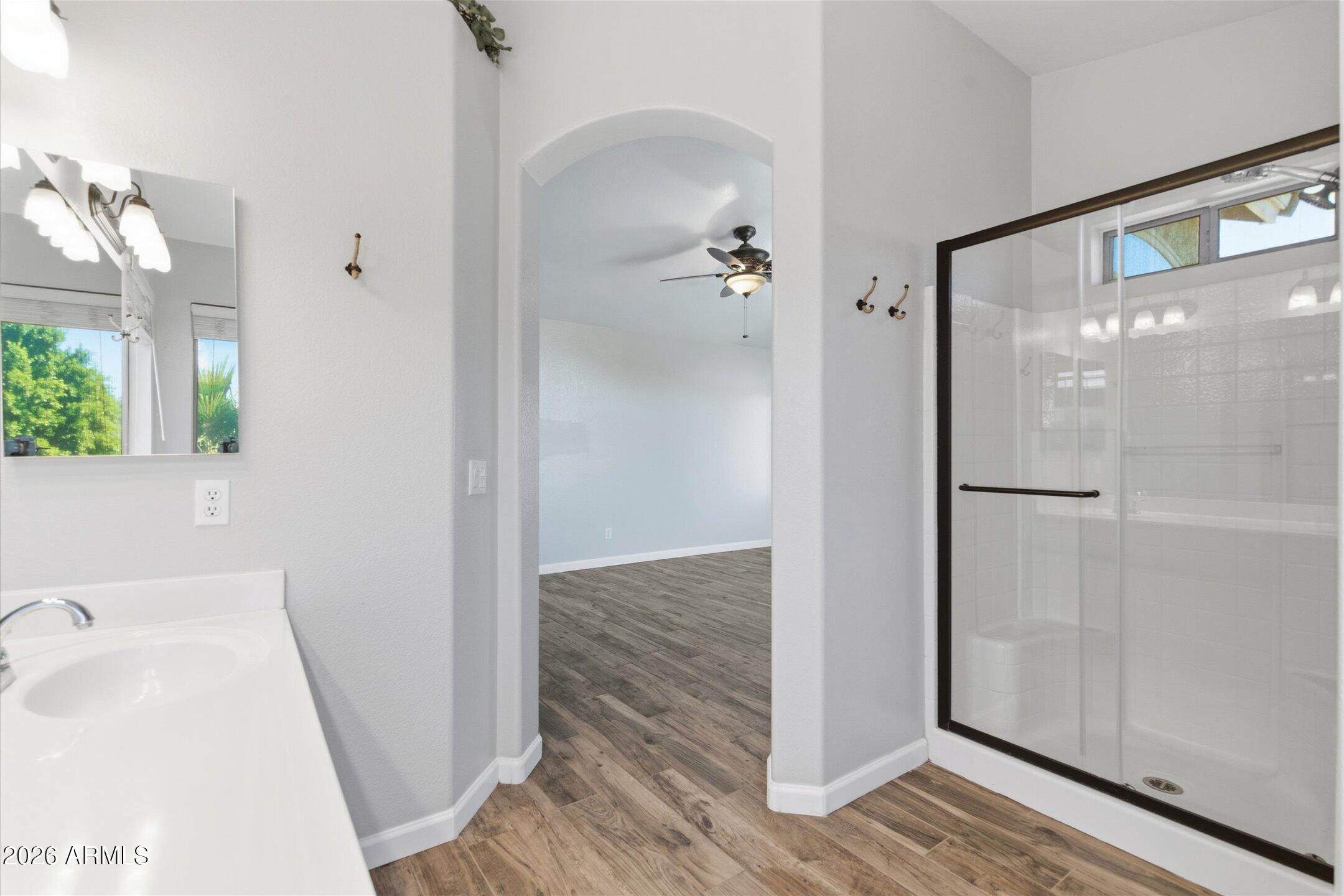 13633 South 47th Street Phoenix, AZ 85044 - Photo 23 of 37 a bathroom with a sink and shower