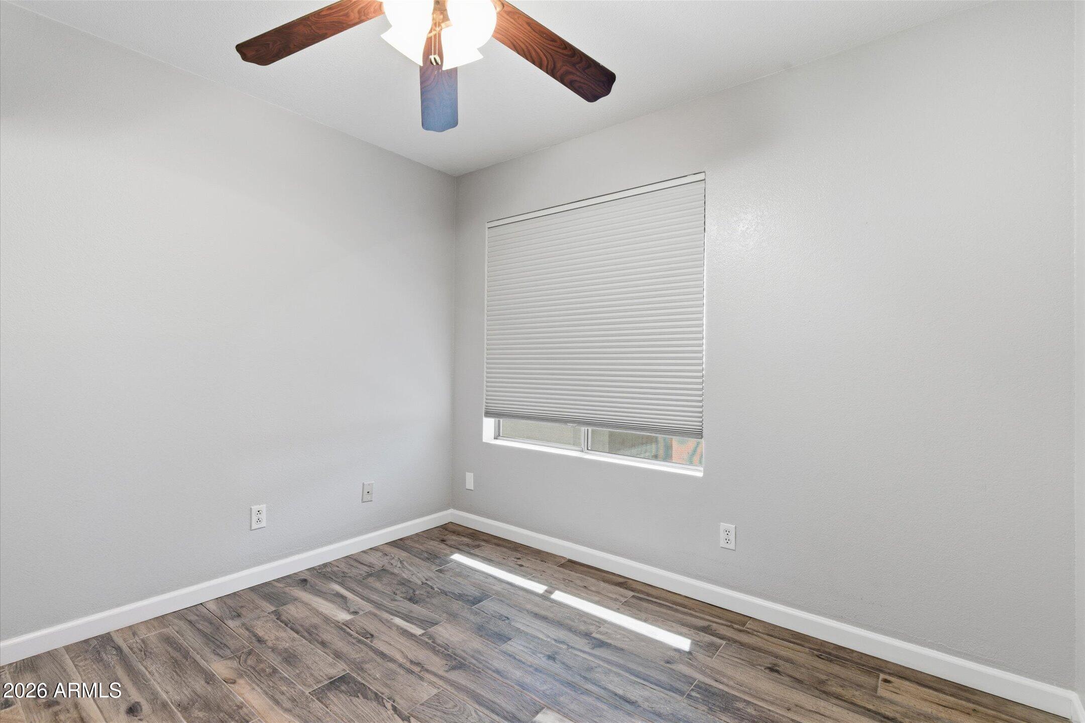 13633 South 47th Street Phoenix, AZ 85044 - Photo 24 of 37 an empty room with a window