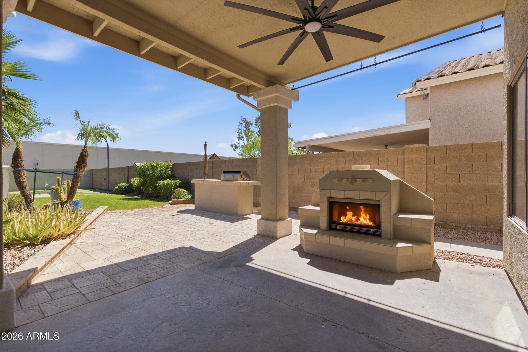 13633 South 47th Street Phoenix, AZ 85044 - Photo 28 of 37 a living room with furniture and a fireplace