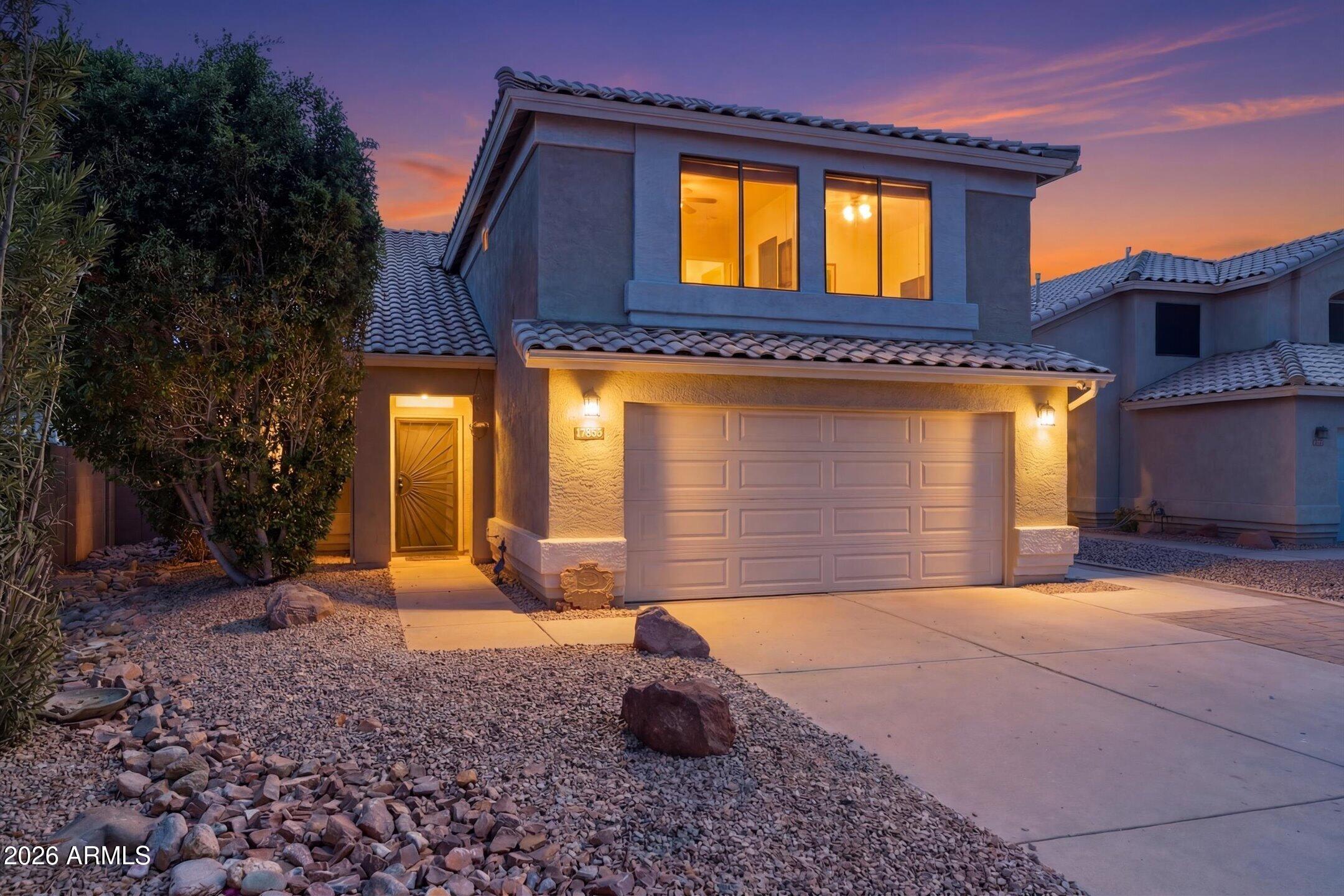13633 South 47th Street Phoenix, AZ 85044 - Photo 2 of 37 a front view of a house