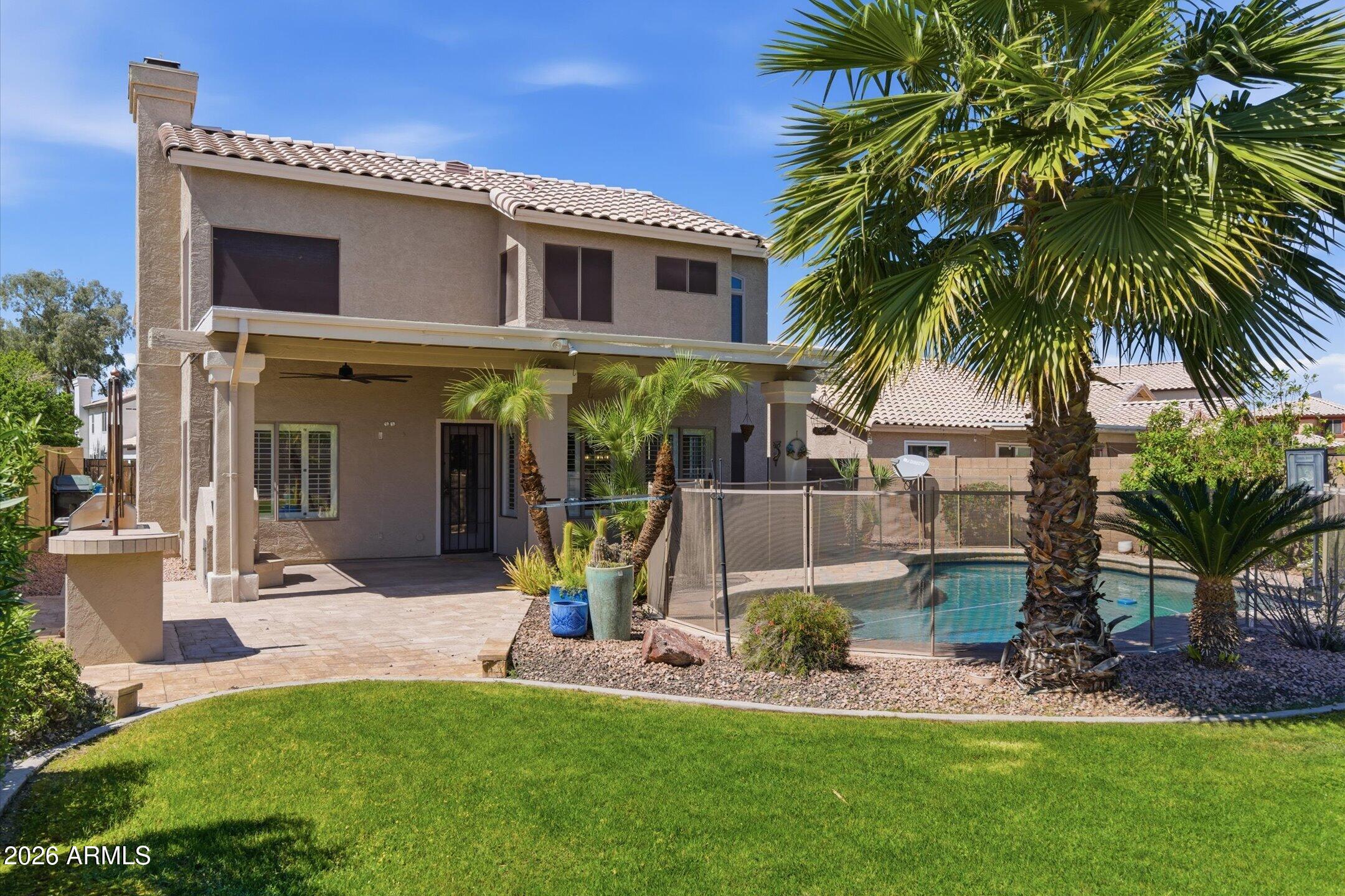 13633 South 47th Street Phoenix, AZ 85044 - Photo 30 of 37 a front view of house with yard and green space