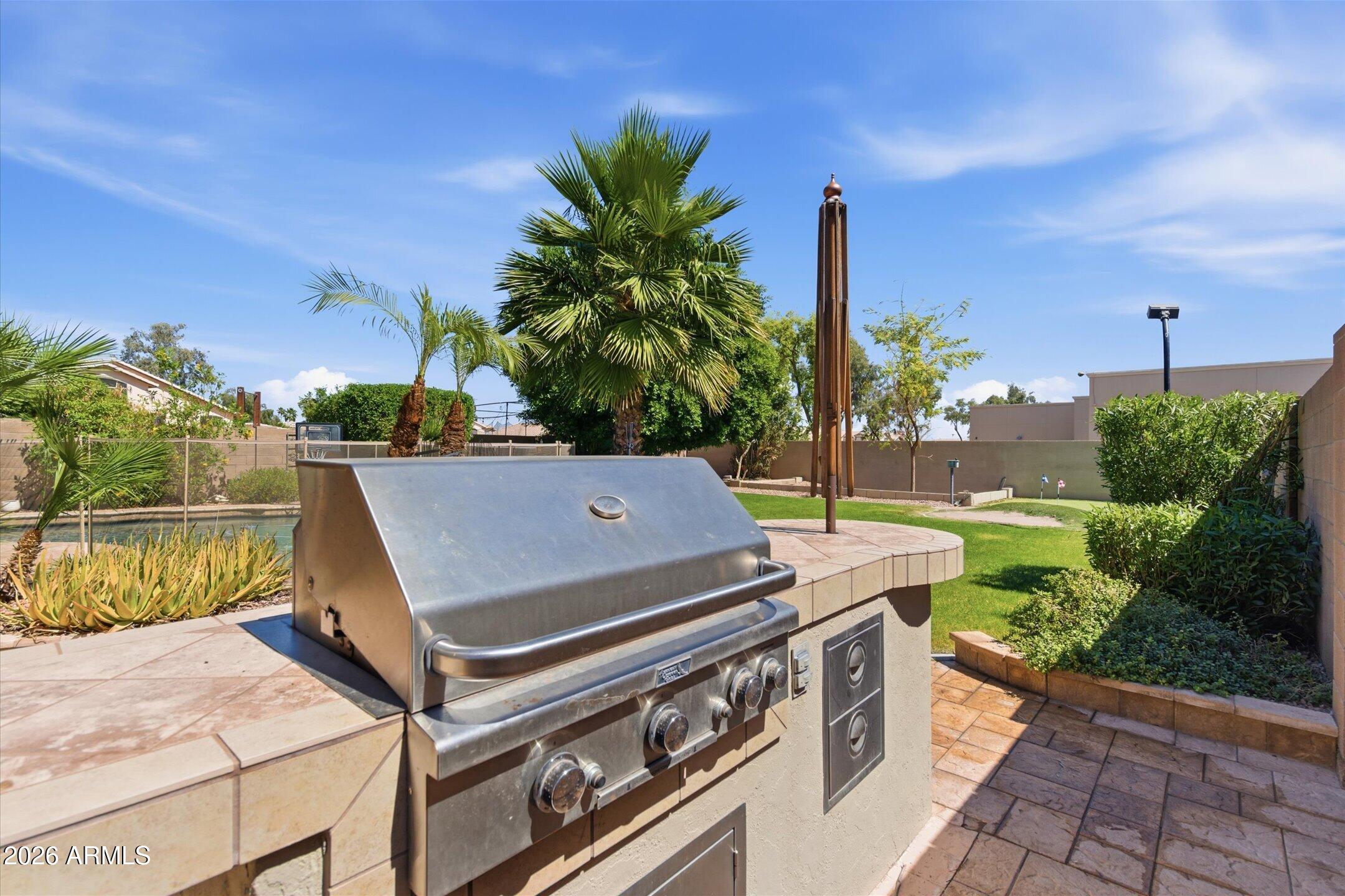 13633 South 47th Street Phoenix, AZ 85044 - Photo 32 of 37 a view of a terrace with chairs