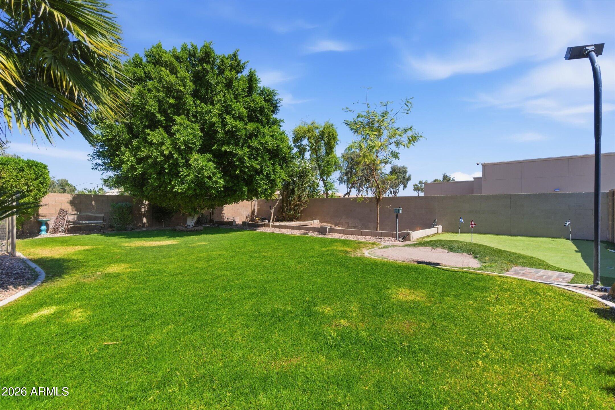13633 South 47th Street Phoenix, AZ 85044 - Photo 33 of 37 a view of an outdoor space and a yard