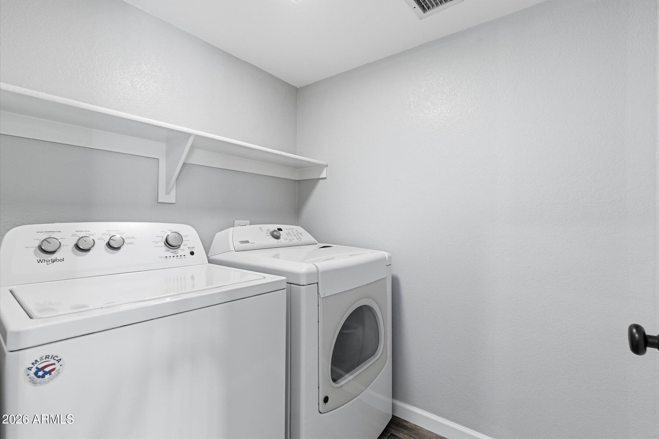 13633 South 47th Street Phoenix, AZ 85044 - Photo 35 of 37 a utility room with dryer and washer