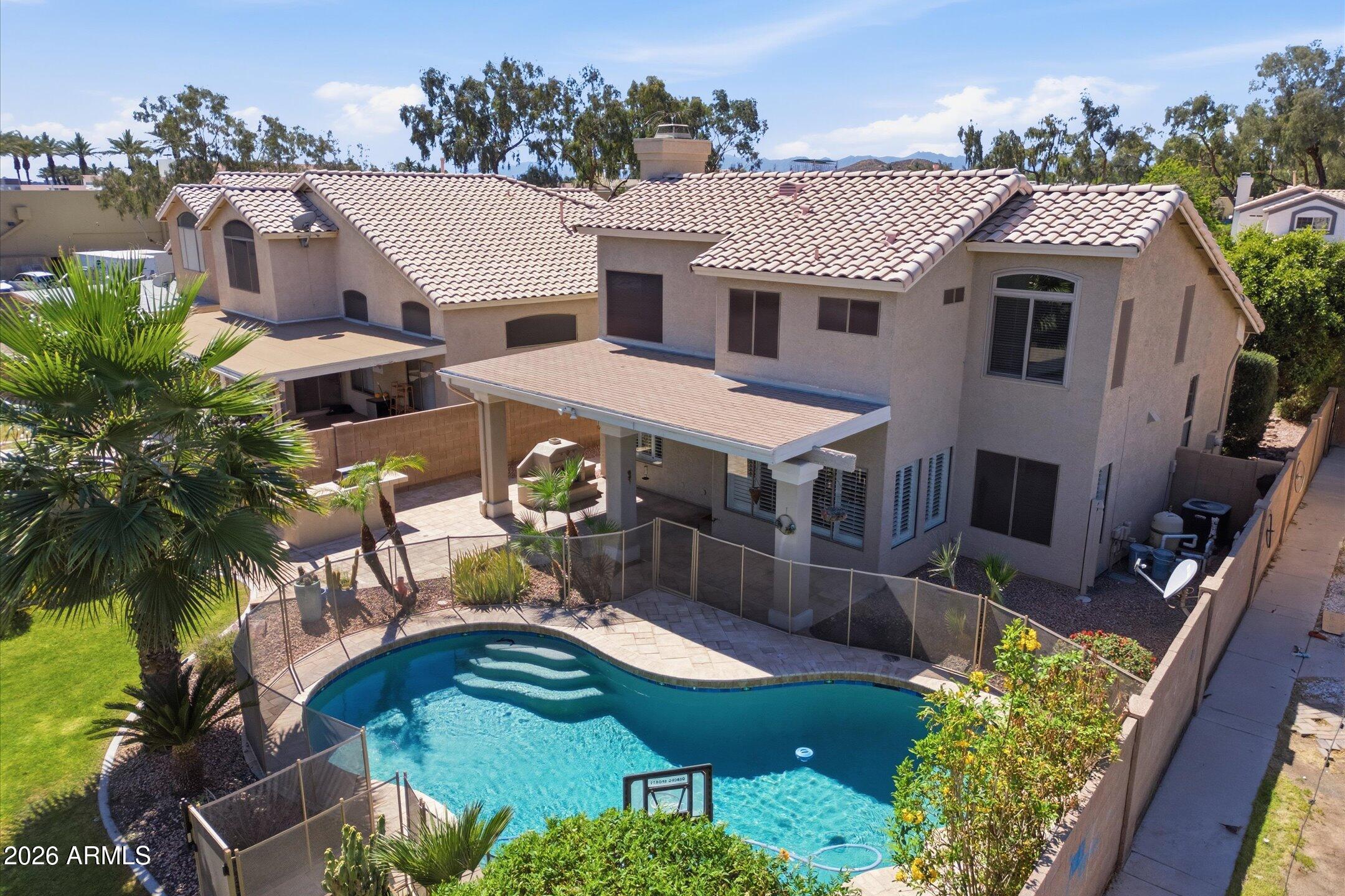 13633 South 47th Street Phoenix, AZ 85044 - Photo 5 of 37 an aerial view of a house with yard swimming pool and outdoor seating