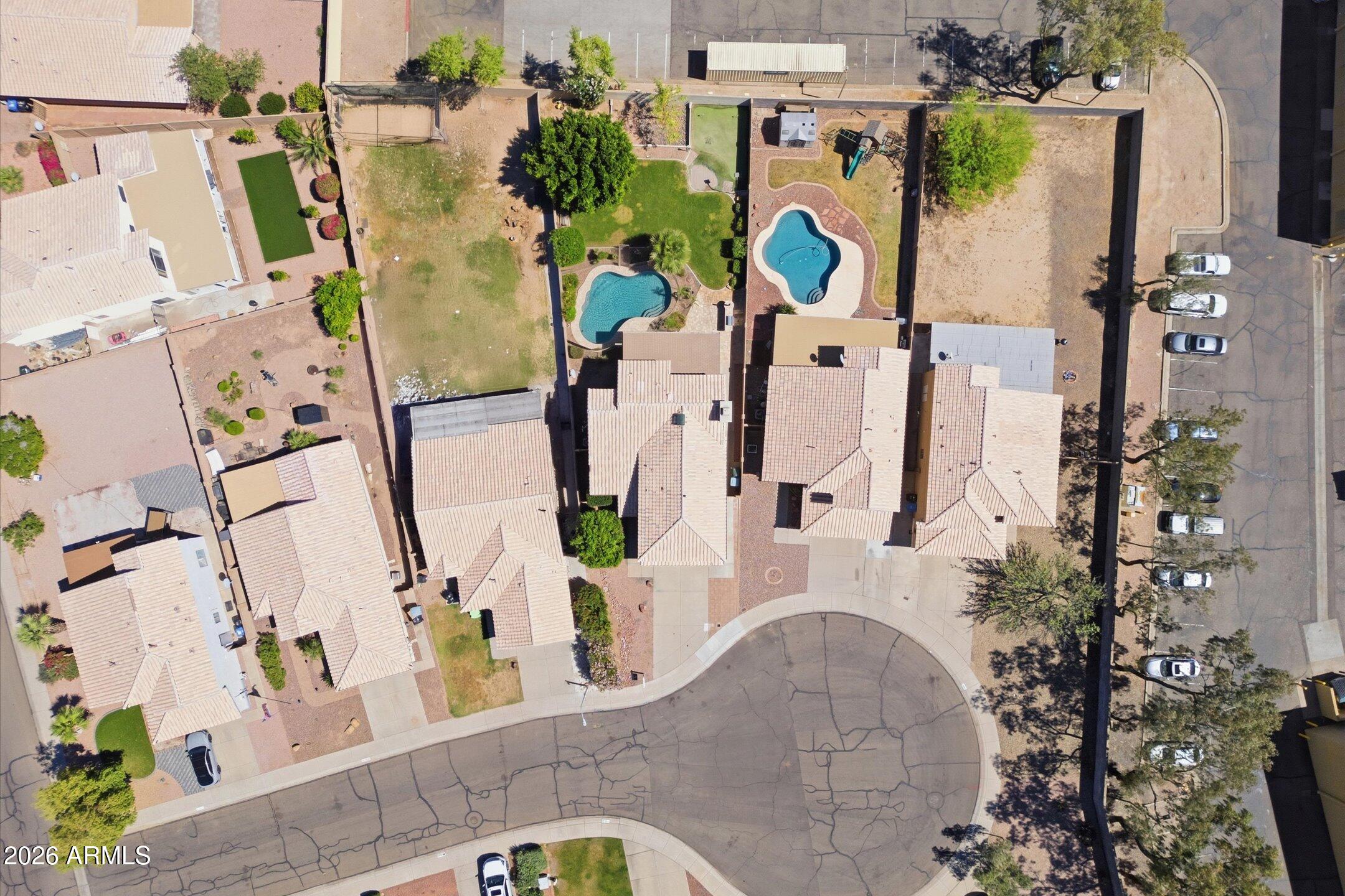 13633 South 47th Street Phoenix, AZ 85044 - Photo 7 of 37 an aerial view of residential house with outdoor space and swimming pool