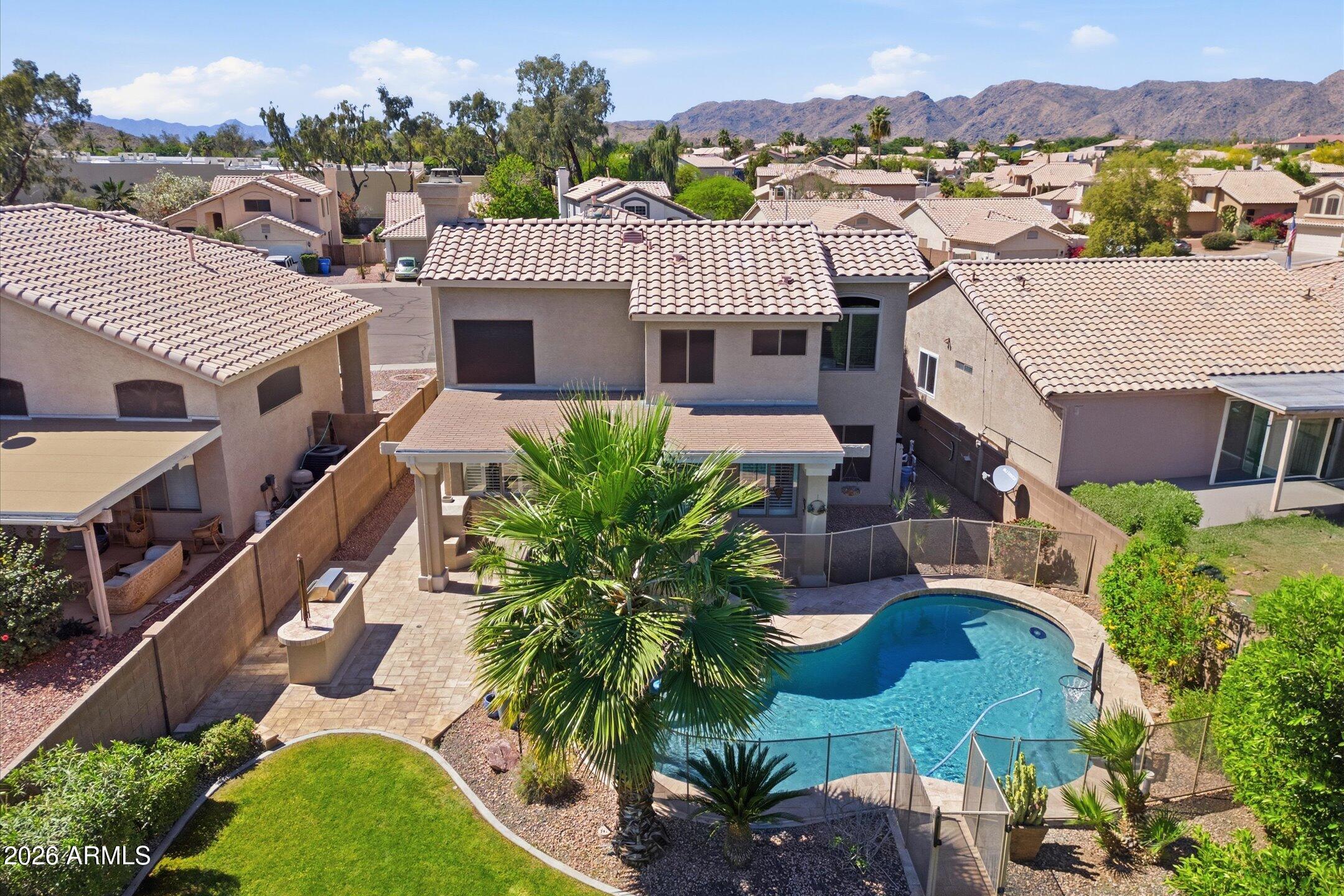 13633 South 47th Street Phoenix, AZ 85044 - Photo 9 of 37 an aerial view of a house with a garden and plants