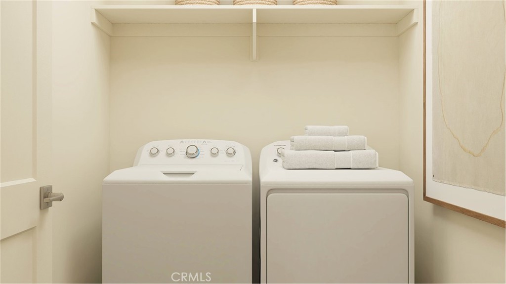 1123 Thunderchief Lane Rialto, CA 92376 - Photo 12 of 20 a utility room with dryer and washer