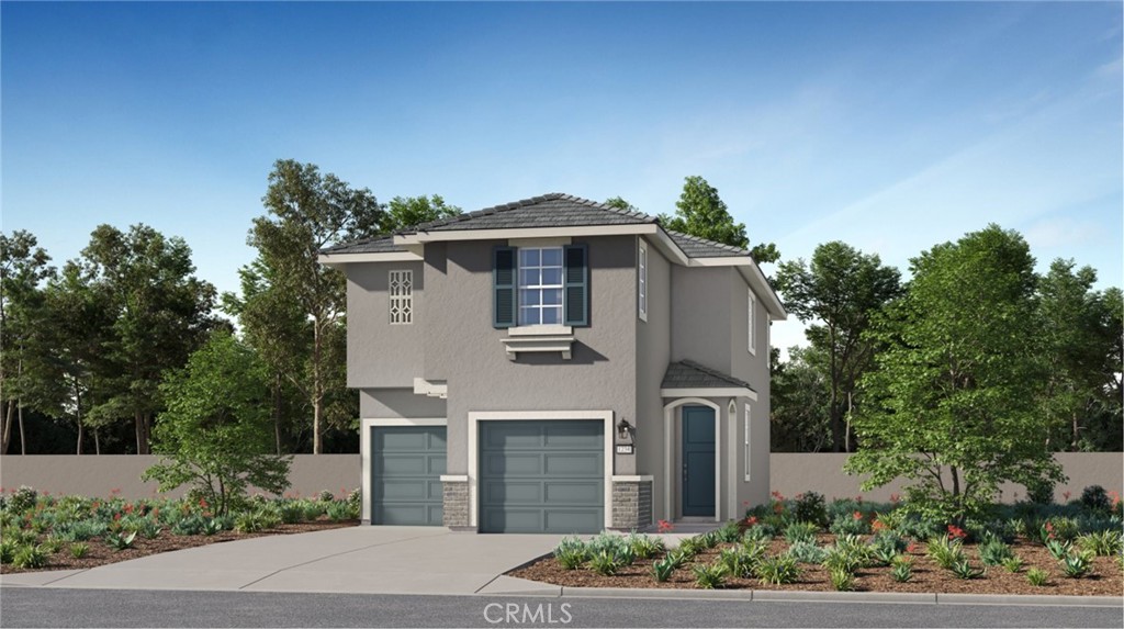 1123 Thunderchief Lane Rialto, CA 92376 - Photo 14 of 20 a front view of a house with a garden