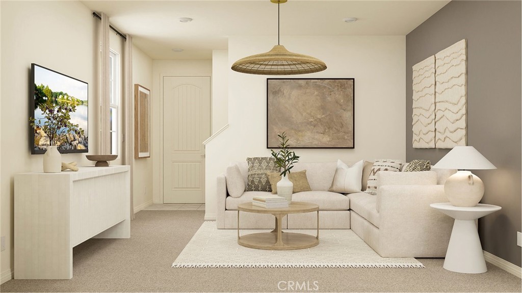 1123 Thunderchief Lane Rialto, CA 92376 - Photo 5 of 20 a living room with furniture a chandelier and a window