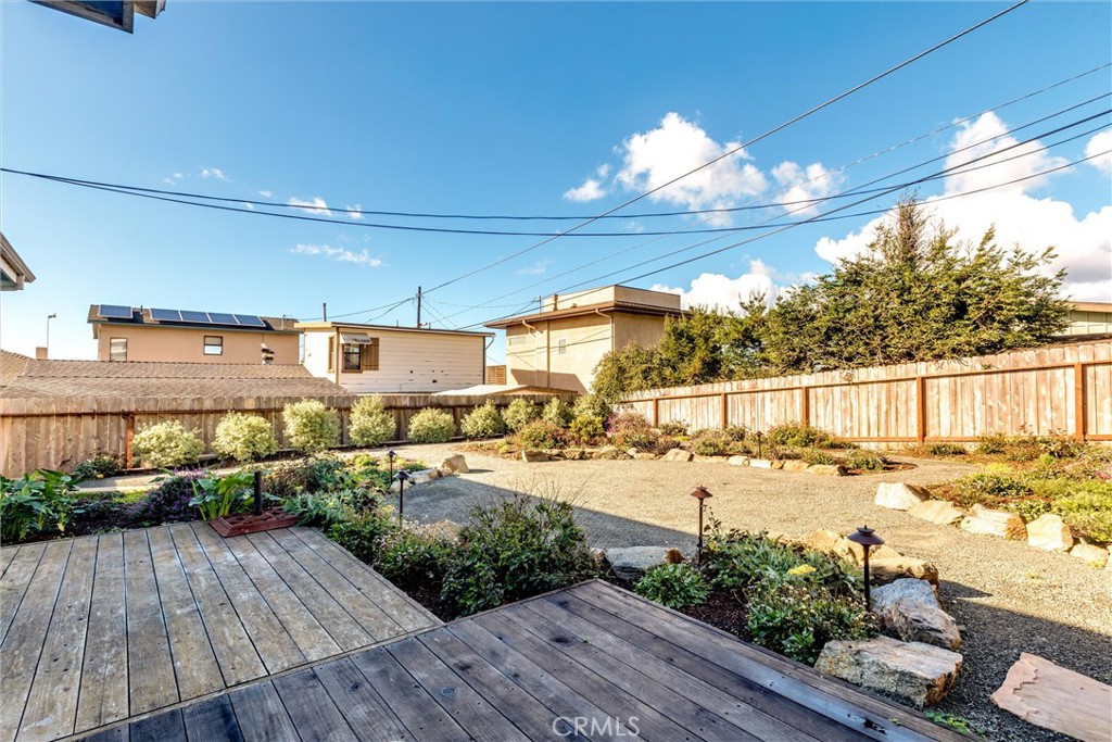 943 Pecho Street Morro Bay, CA 93442 - Photo 17 of 19 a view of a room with wooden floor