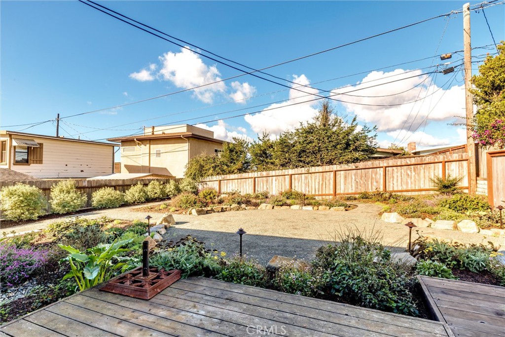943 Pecho Street Morro Bay, CA 93442 - Photo 3 of 19 a view of a house with a yard