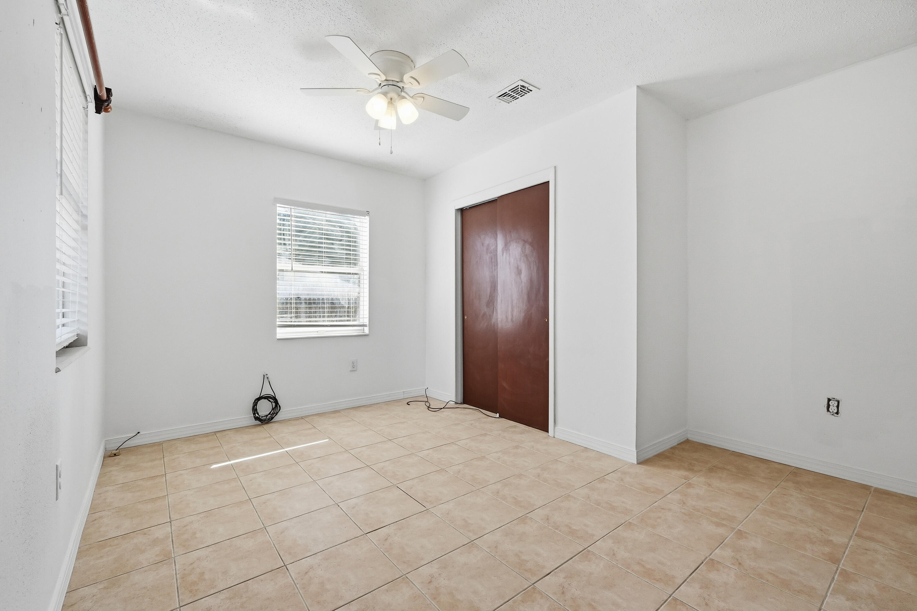 63 Oak Lane Shalimar, FL 32579 - Photo 27 of 42 a view of an empty room with a window