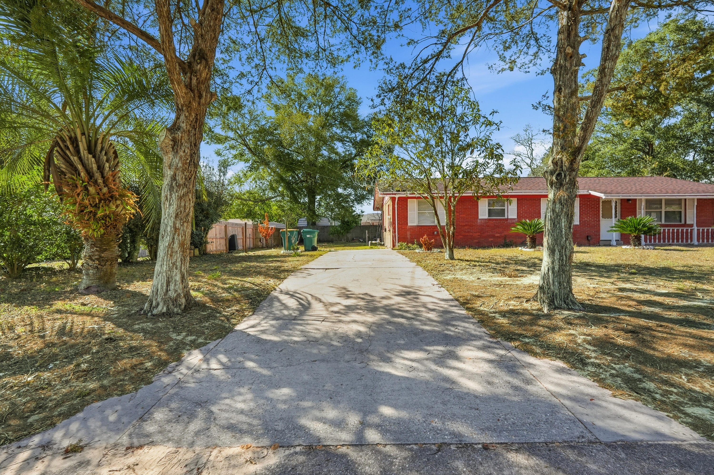 63 Oak Lane Shalimar, FL 32579 - Photo 32 of 42 a view of a house with a yard