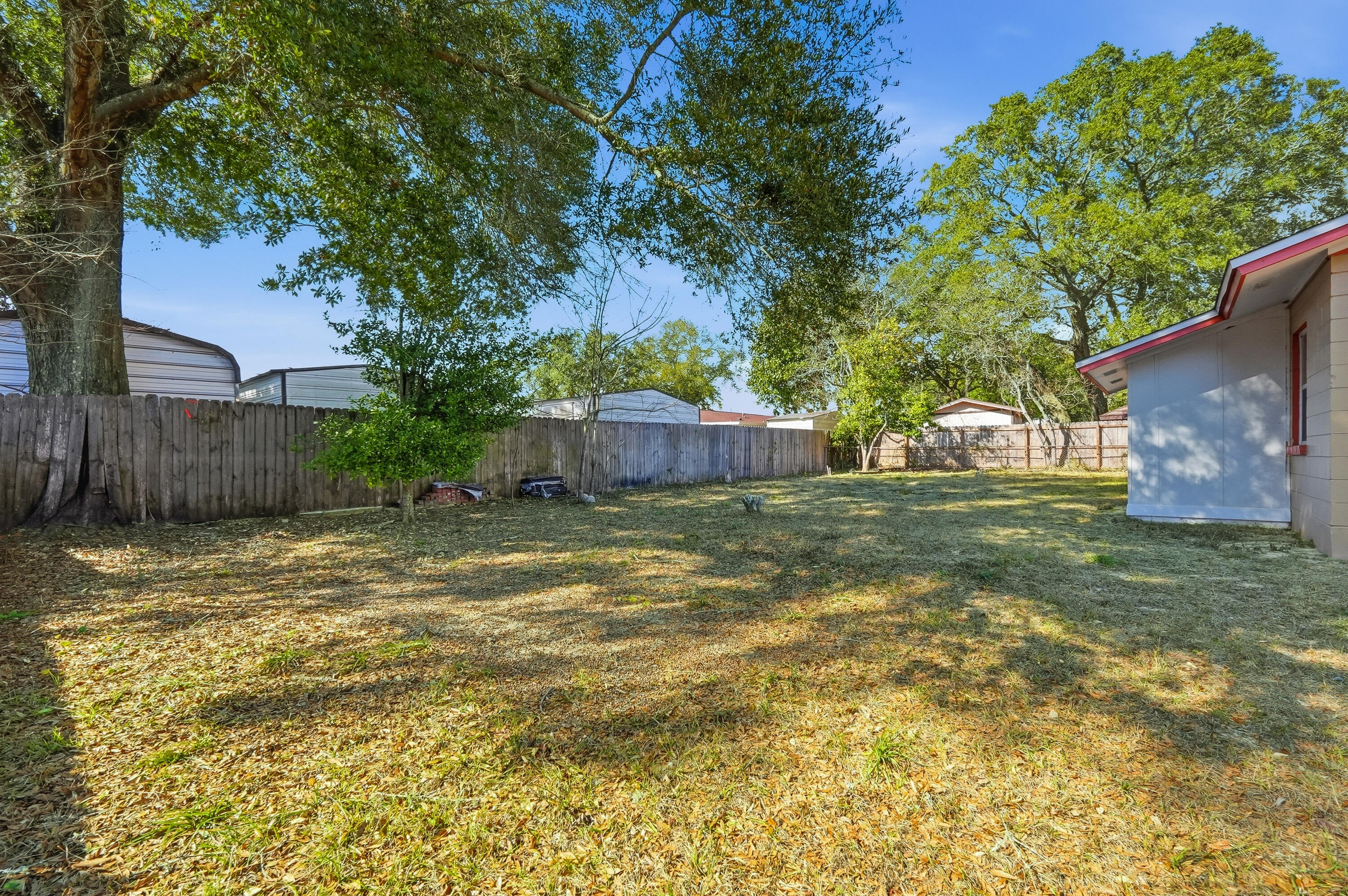 63 Oak Lane Shalimar, FL 32579 - Photo 35 of 42 a backyard of a house