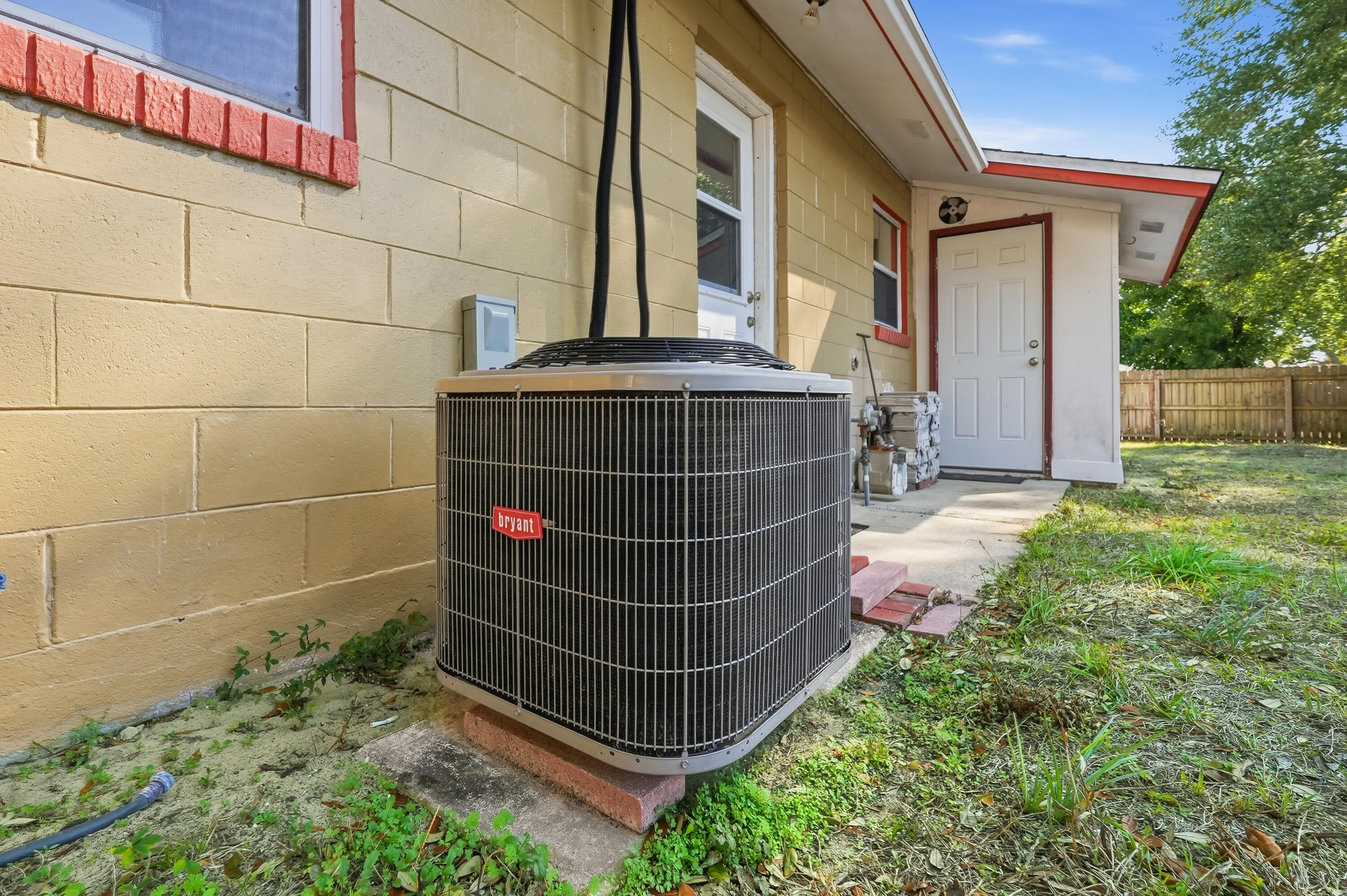 63 Oak Lane Shalimar, FL 32579 - Photo 41 of 42 a front view of a house with a garden