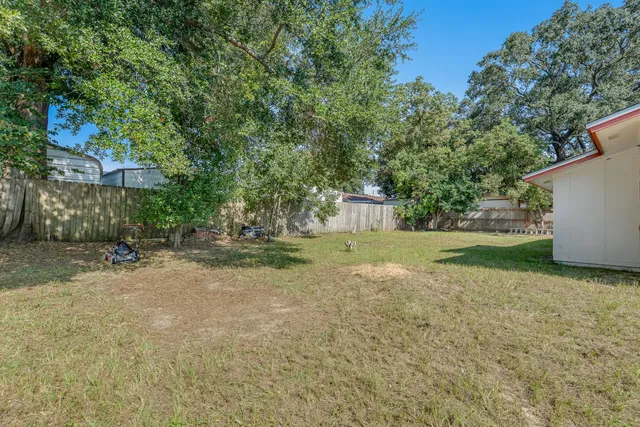 a view of backyard with green space