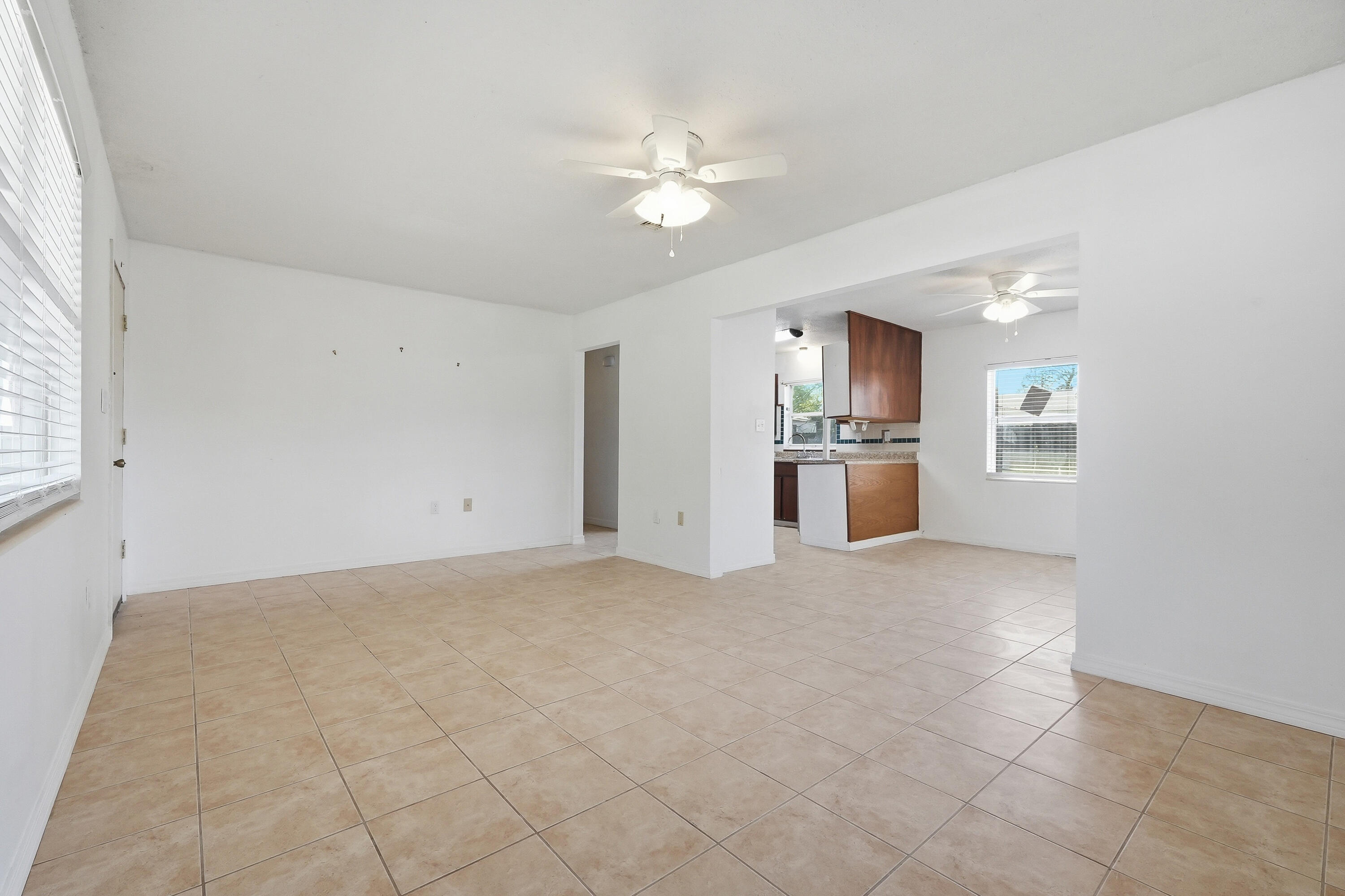 63 Oak Lane Shalimar, FL 32579 - Photo 7 of 42 a view of a kitchen with a stove cabinets and a kitchen