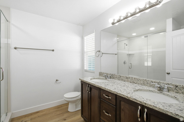664 South Saddle Road Grantsville, UT 84029 - Photo 12 of 39 Primary bathroom with dual vanity and extra large shower with upgraded glass.