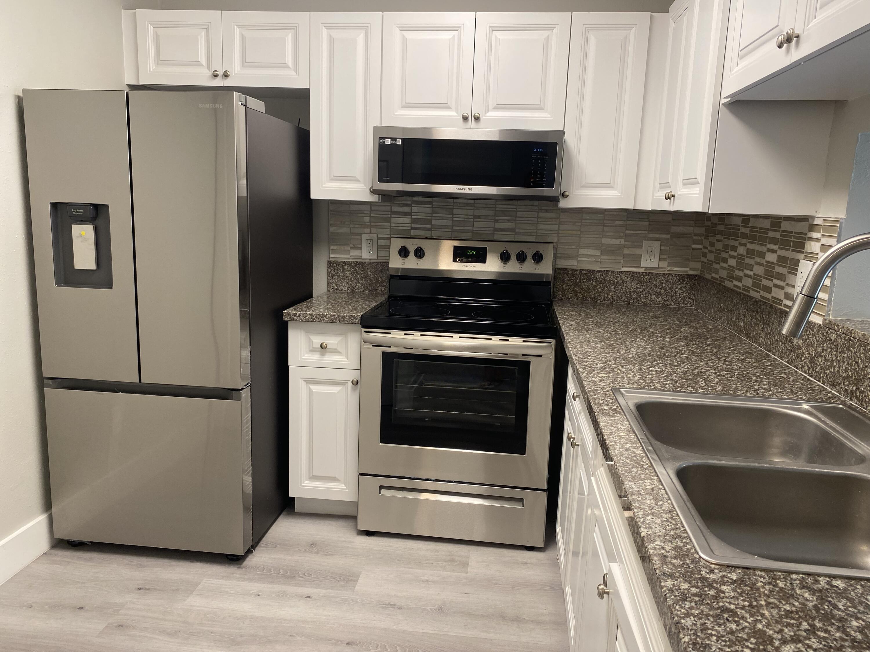 11432 Northwest 43rd Street, Unit TOP RIGHT Coral Springs, FL 33065 - Photo 1 of 30 IMG_3306