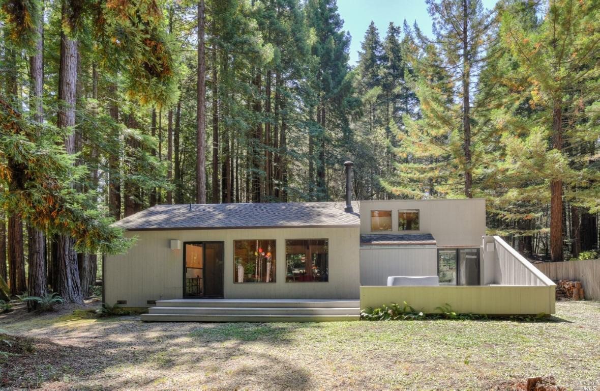 front view of a house with a yard