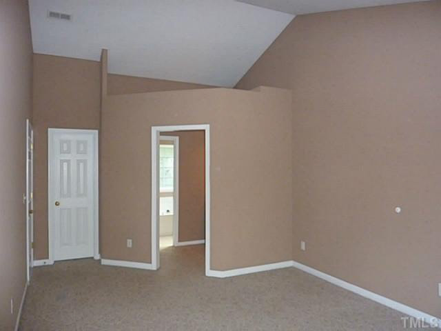 3324 Forest Mill Circle Raleigh, NC 27616 - Photo 13 of 25 Huge walk-in closet to the left, and bathroom access to the right.