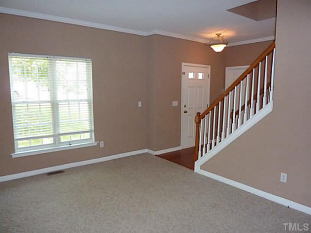 3324 Forest Mill Circle Raleigh, NC 27616 - Photo 3 of 25 Formal Living Room at the front of the house is spacious and inviting. Notice the crown molding!