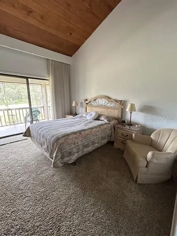 a spacious bathroom with a double vanity sink and a mirror