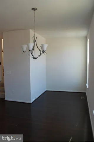 a view of a small space with racks on the wall