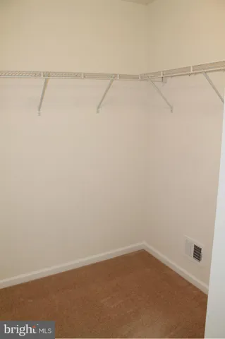 a view of small space with racks on the wall