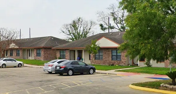 a car parked in front of a house