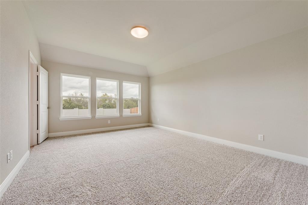 3206 Ferrero Lane Princeton, TX 75407 - Photo 17 of 29 an empty room with windows
