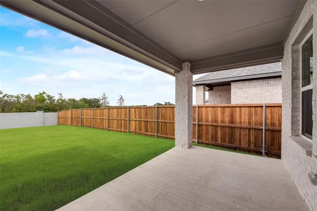 a view of outdoor space with backyard